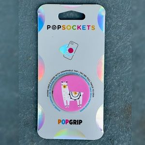 Phone grip and stand with Swappable top